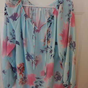 Long sleeved. Blue flowered blouse. 3XL. Ties in front at collar.